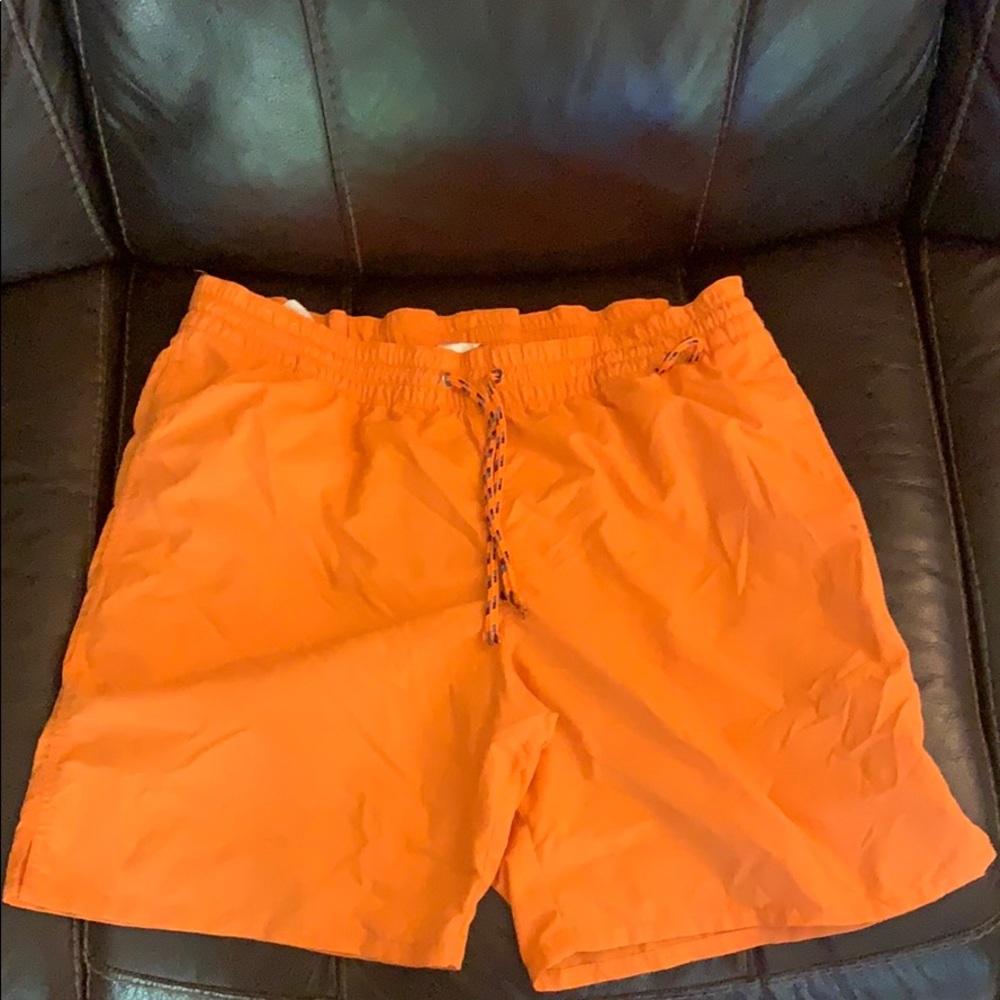 Orange men’s swimming suit, large